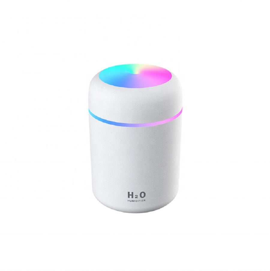 White humidifier with colorful LED light on a white background