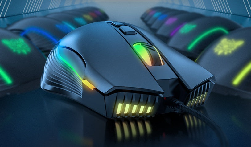 Gaming mouse with RGB lighting on a reflective surface