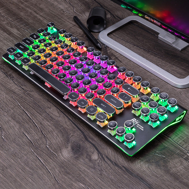 Colorful keyboard with RGB lighting on a wooden surface