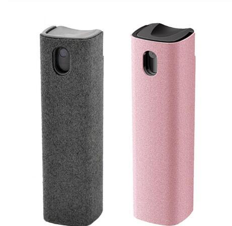 Two cylindrical containers, one gray and one pink, on a white background