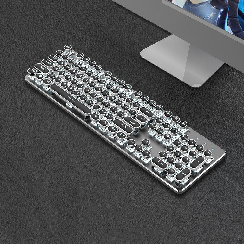Mechanical keyboard with transparent keycaps on a dark surface