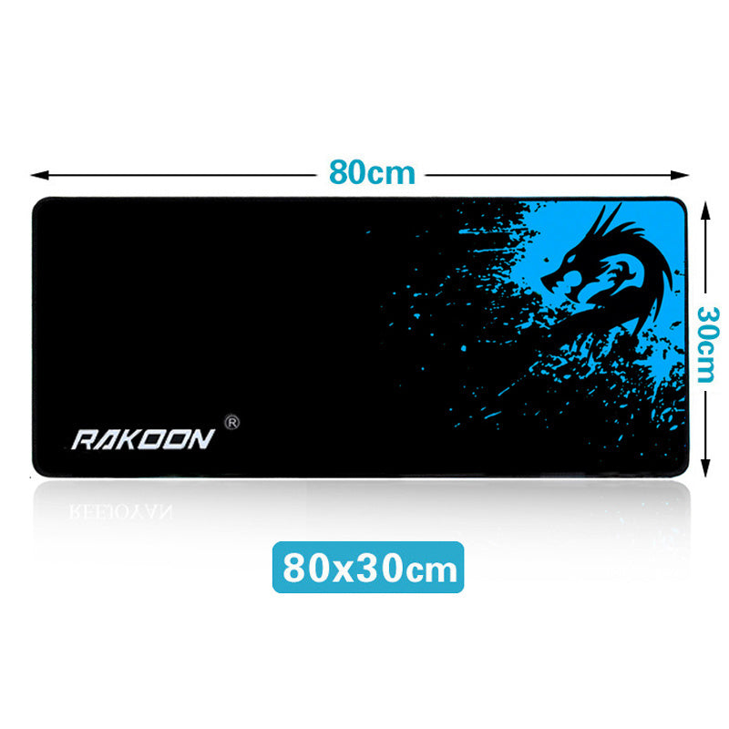 Gaming mouse pad with blue dragon design and dimensions on a white background