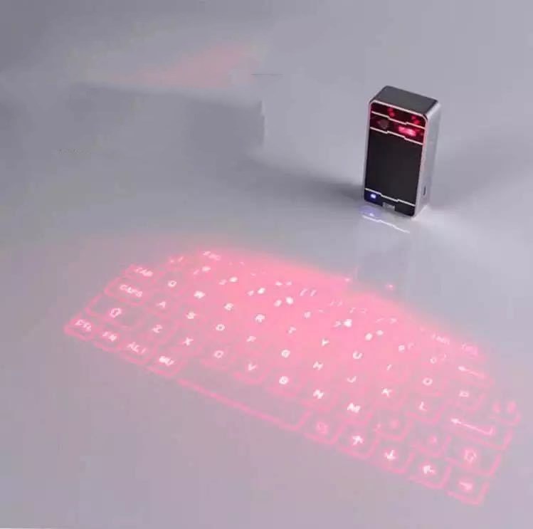 Laser keyboard projection device on a gray surface