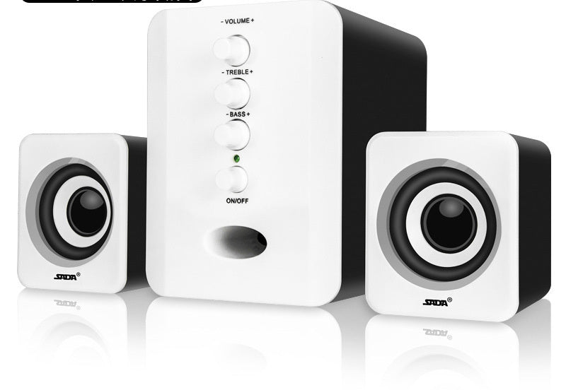 White computer speakers with control buttons on a white background
