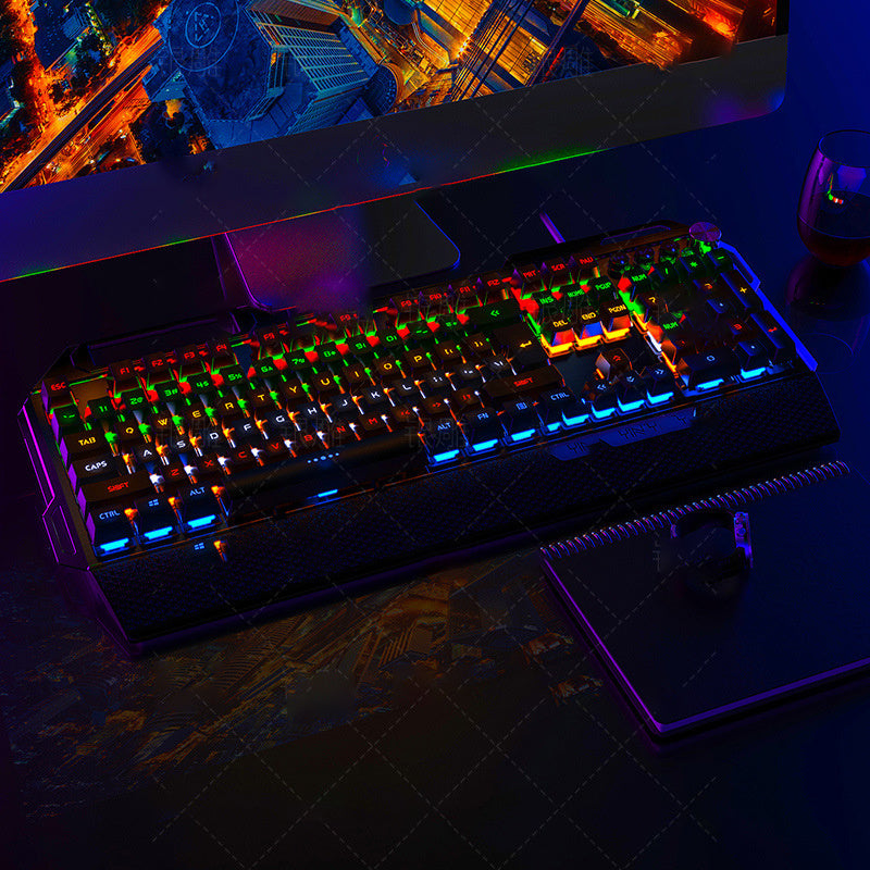 Colorful keyboard on a dark desk with a cityscape in the background
