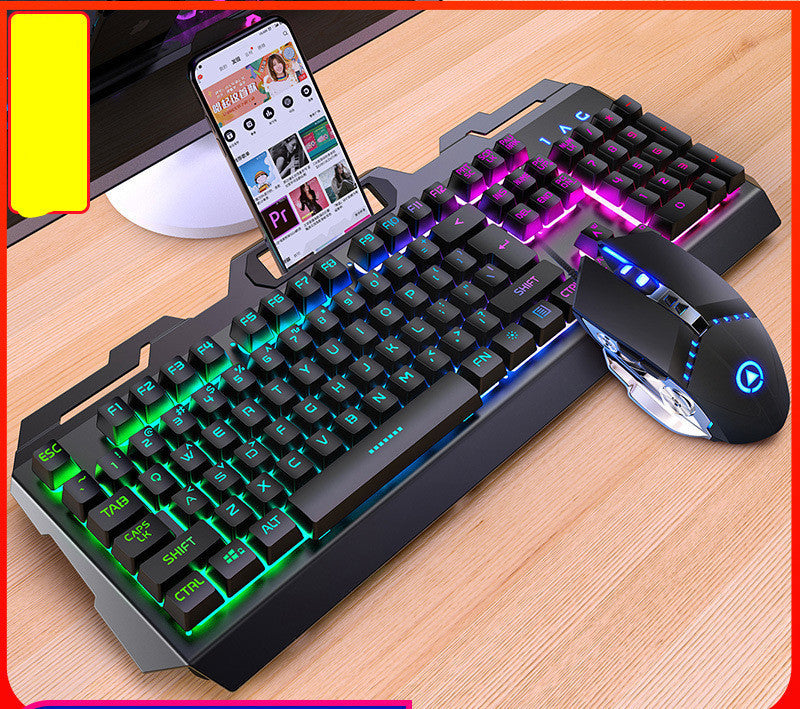 Gaming keyboard and mouse set with RGB lighting on a wooden desk.