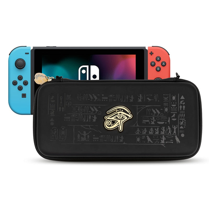 Gaming console with a black carrying case featuring hieroglyphics and an eye symbol on a white background