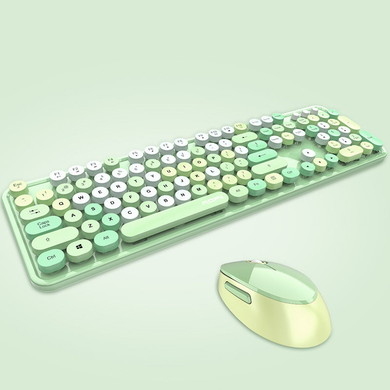 Colorful keyboard and mouse set on a light green background