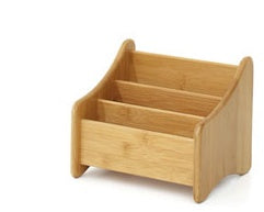 Wooden magazine rack on a white background