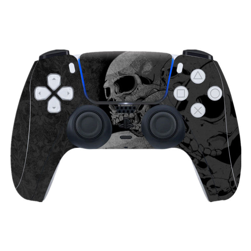 Gaming controller with skull design on a white background