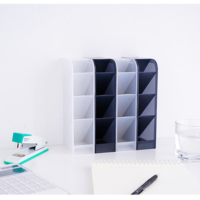 Desk organizer with stationery items on a white background