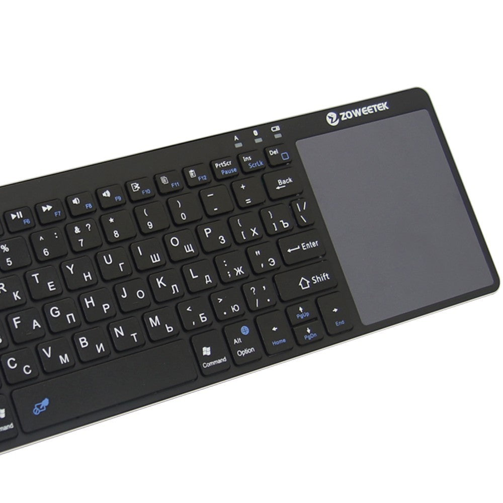 Black keyboard with touchpad on a white background, featuring the ZOWIEZEK brand.