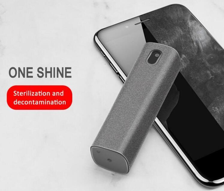 Phone with a cleaning device labeled 'One Shine' for sterilization and decontamination on a light background.