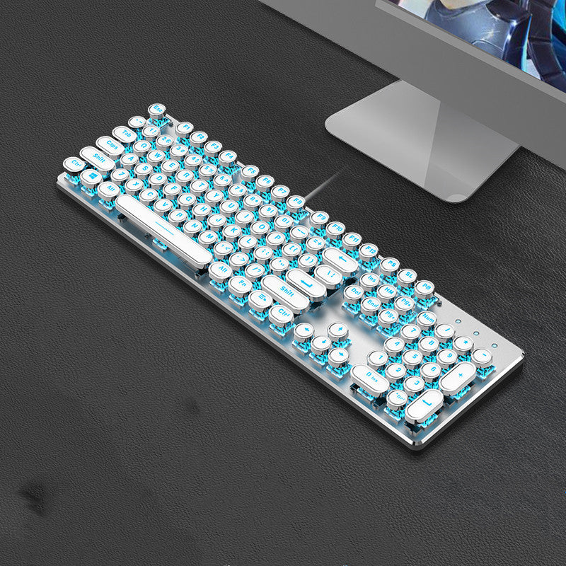 Mechanical keyboard with blue and white keys on a dark surface