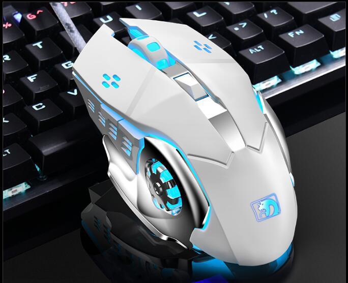 Gaming mouse with blue accents on a keyboard