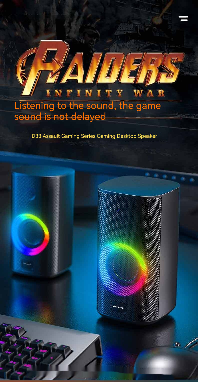 Gaming speakers with colorful lighting effects on a dark background, featuring the brand 'Assault Gaming'.