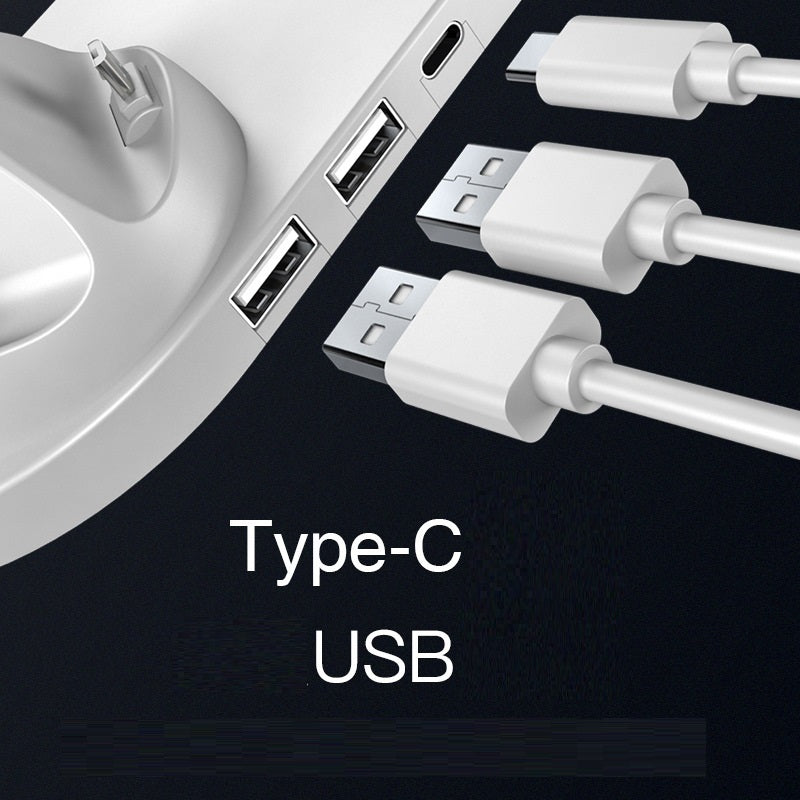 Close-up of a device with USB ports and Type-C cable, on a black background.