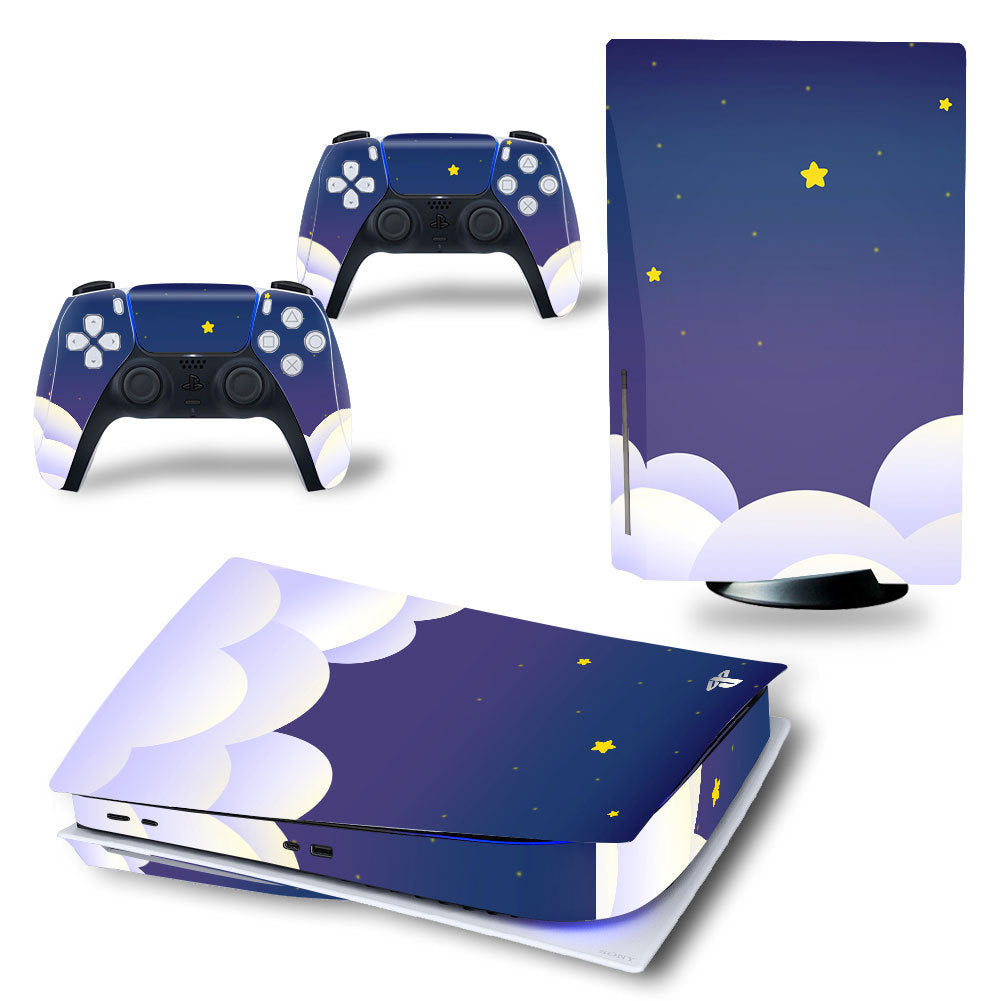 Gaming console and controllers with starry night design decal on a white background