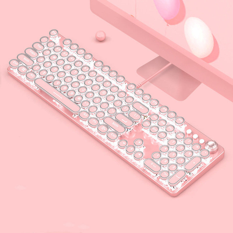 Clear keyboard with pink accents on a pink background
