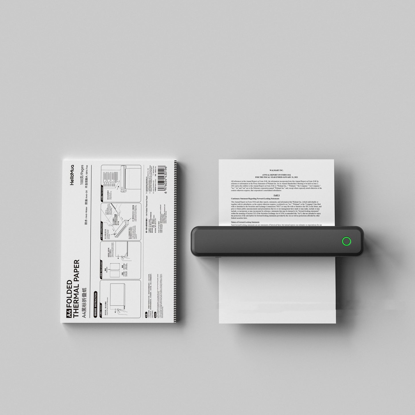 Handheld printer with a document on a gray background