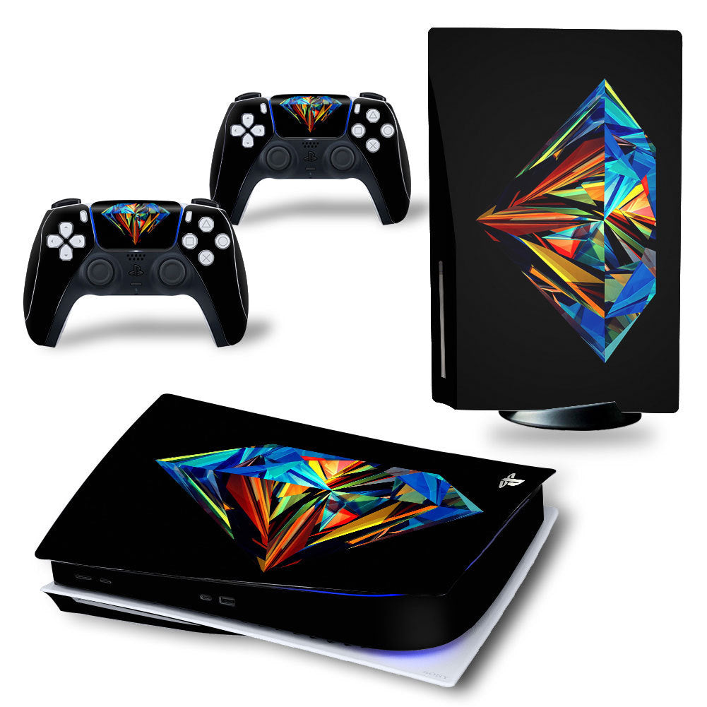 Gaming console and controllers with colorful diamond design decal on a white background