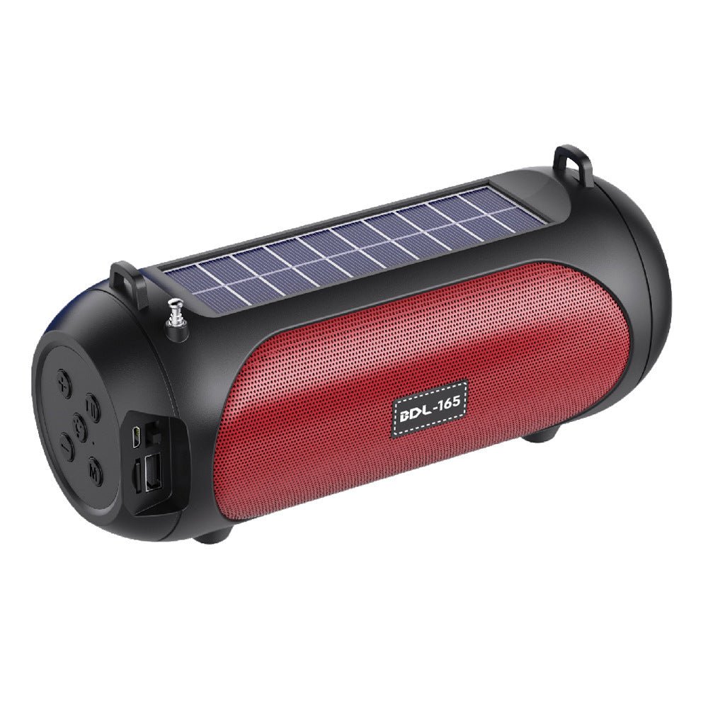 Red and black cylindrical solar-powered speaker on a white background