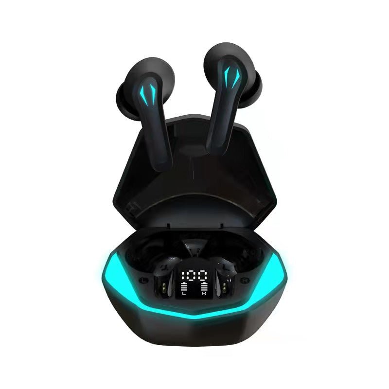 Black wireless earbuds with blue accents in an open charging case on a white background