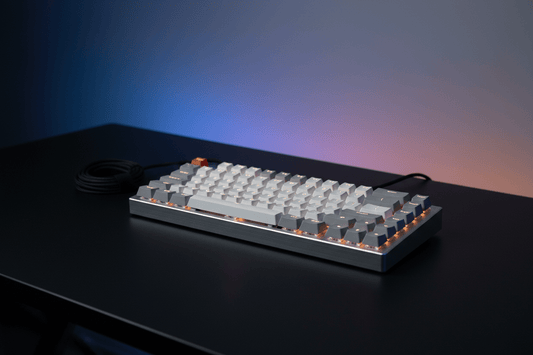 Mechanical keyboard on a clean RGB gaming desk setup