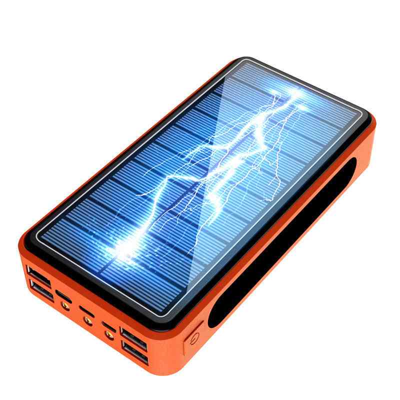 Orange solar power bank with a screen displaying lightning graphics on a white background
