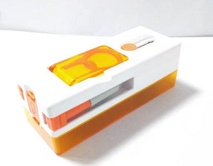 Orange and white kitchen tool on a white background