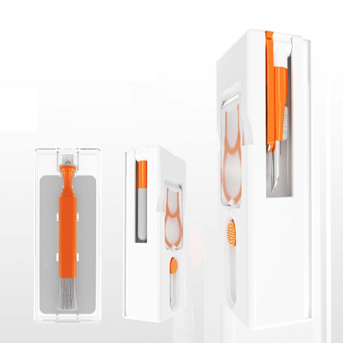 Set of orange and gray toothbrushes in packaging on a white background