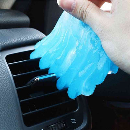 Blue gel pack being placed into a car air vent