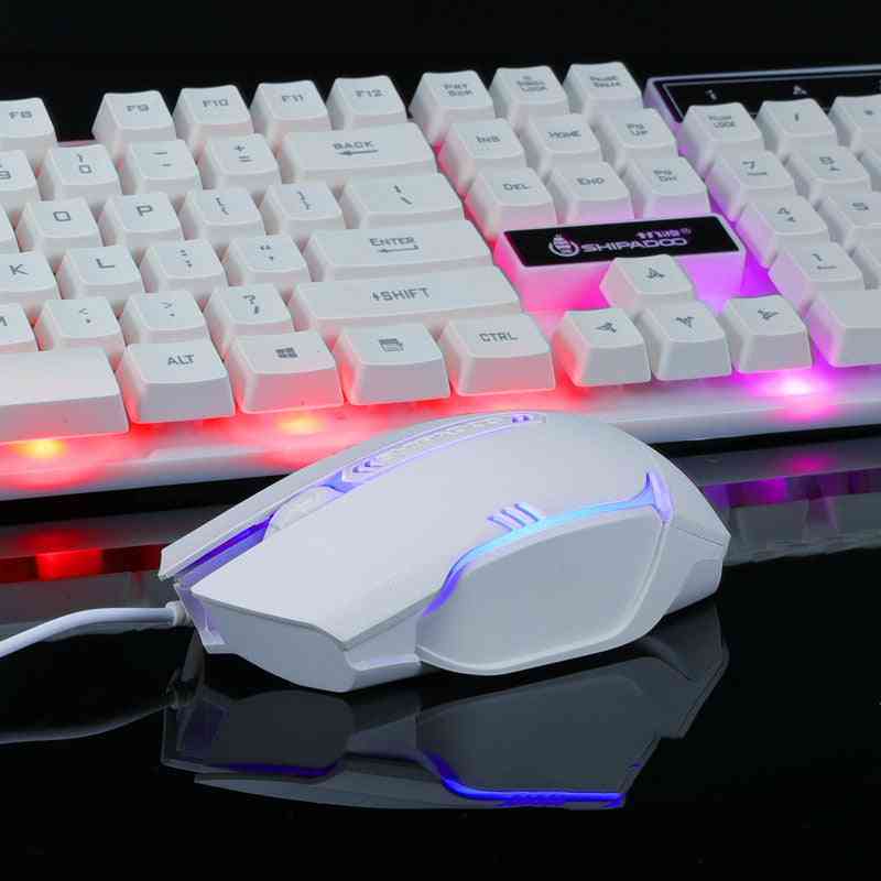 Gaming keyboard and mouse set with RGB lighting on a reflective surface