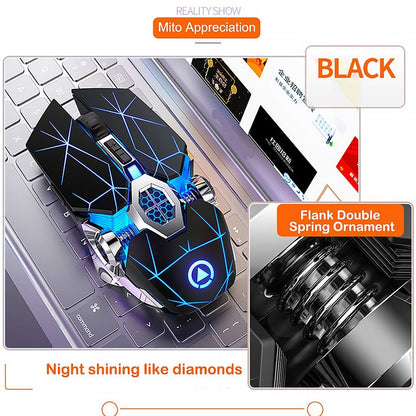 Black and blue decorative object with spring ornament on a laptop keyboard, labeled 'Black' and 'Flank Double Spring Ornament'.