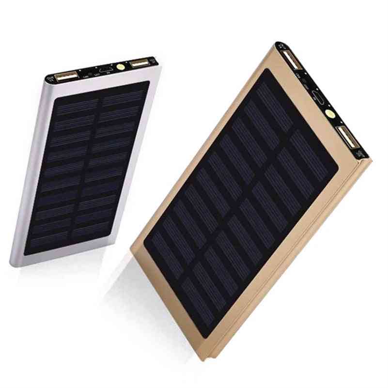 Two solar power banks, one gold and one silver, on a white background.