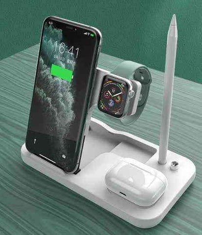 Multi-device charging stand with phone, watch, and airpods on a green surface