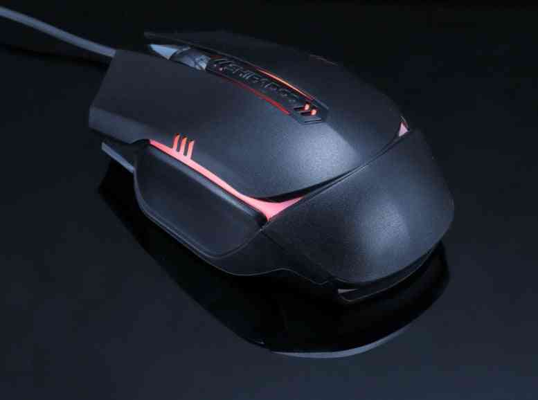 Gaming mouse with red accents on a dark background