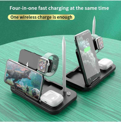 Multi-device charging station with phone, watch, and earbuds on a green surface