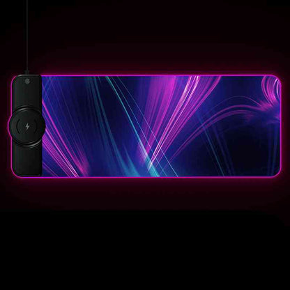 Gaming mouse pad with LED lighting and wireless charging pad on a black background