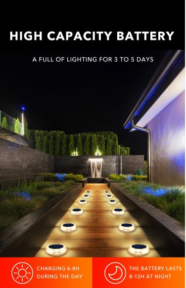 Glowing pathway lights in a garden setting with text about high capacity battery life.