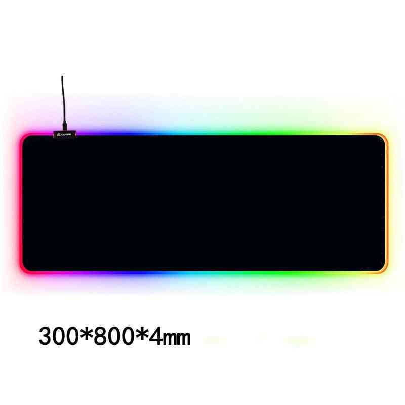 Gaming mouse pad with RGB lighting on a white background