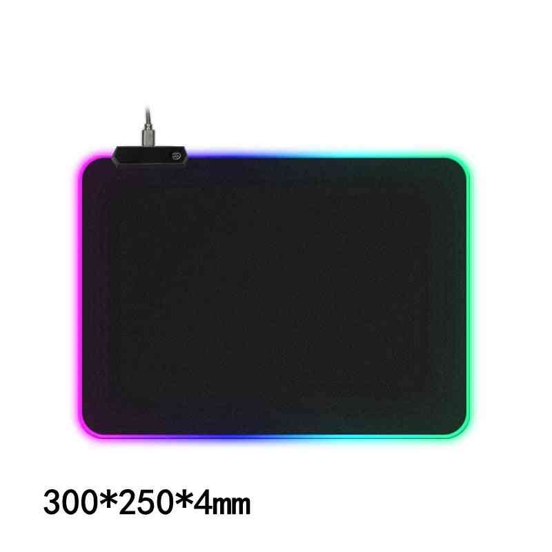 Gaming mouse pad with RGB lighting on a white background