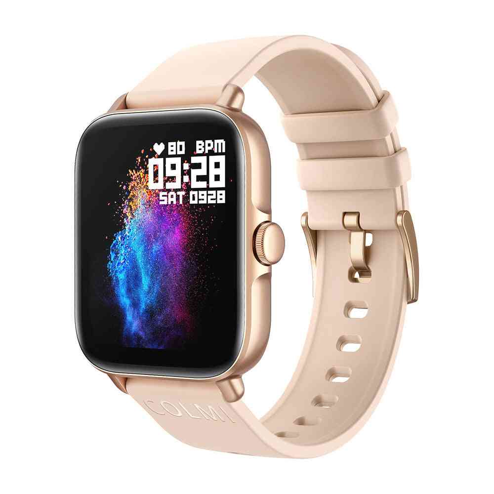 Smartwatch with a beige strap on a white background