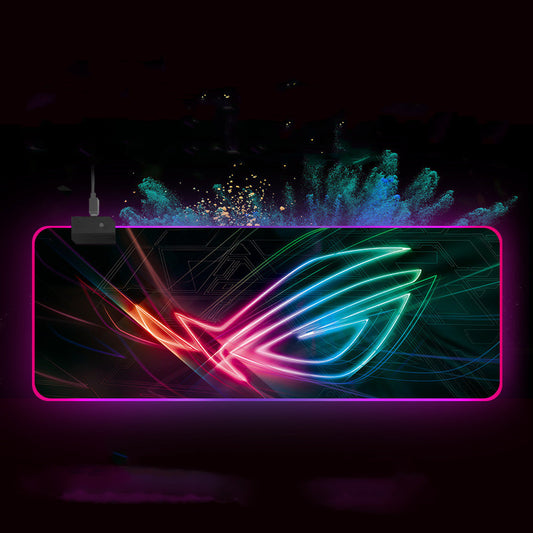 Gaming mouse pad with colorful design and angel wings on a dark background