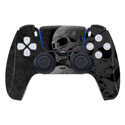 Gaming controller with skull design on a white background