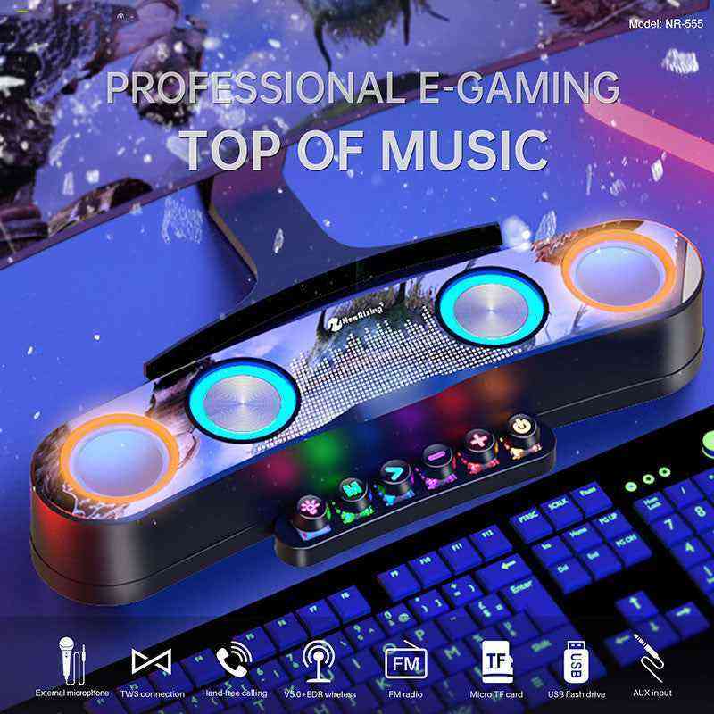 NewRixing RGB Bluetooth speaker with colorful LED lights on gaming keyboard setup