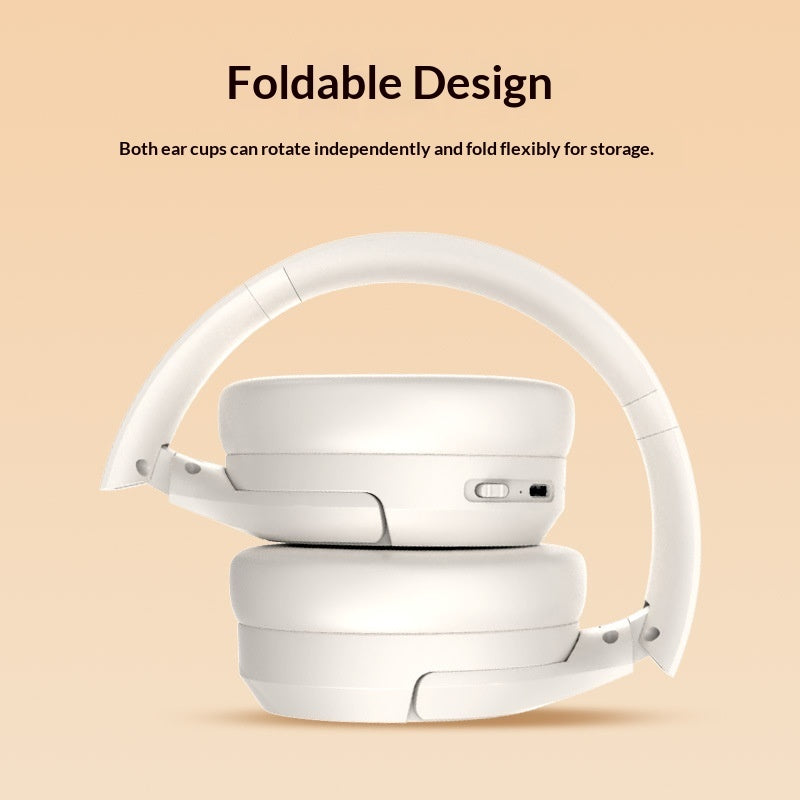 Foldable white headphones on a beige background with text about their design.