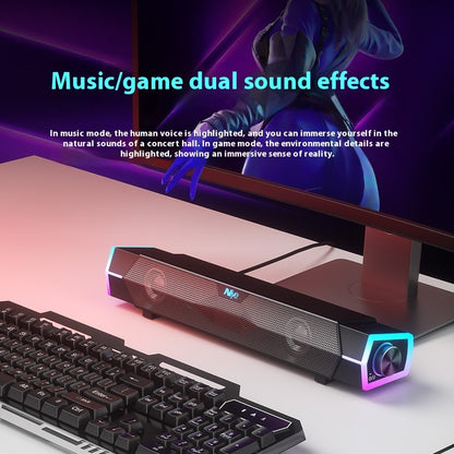 Sound bar with keyboard on desk, highlighting music/game dual sound effects.