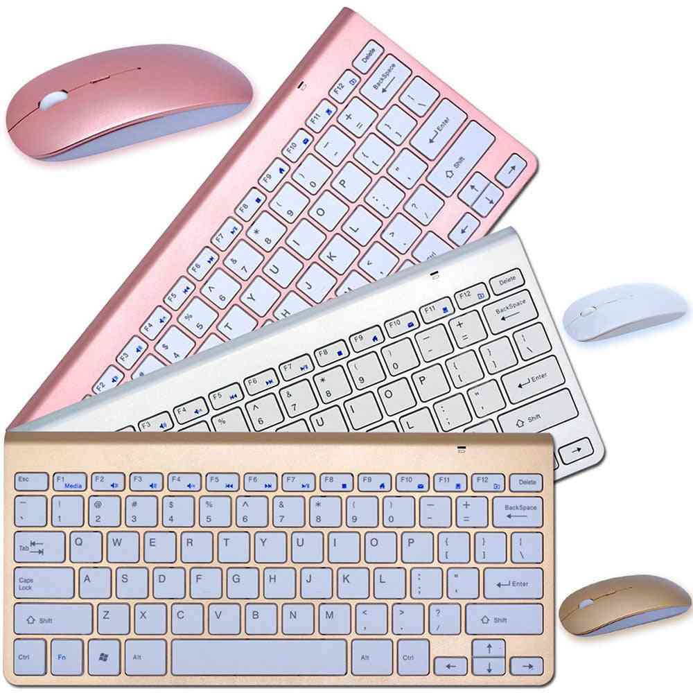 Set of wireless keyboards and mice in rose gold, silver, and gold on a white background