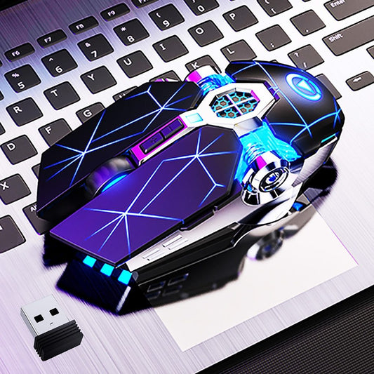Glowing gaming mouse on a desk with keyboard in the background